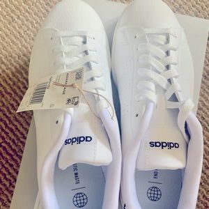 Adidas womens leather tennis shoes with zebra print on heel. Size 10